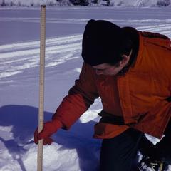Measuring snow depth on Mystery Lake
