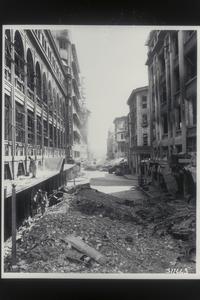 Debris amid damaged buildings after bombings, Manila, 1945