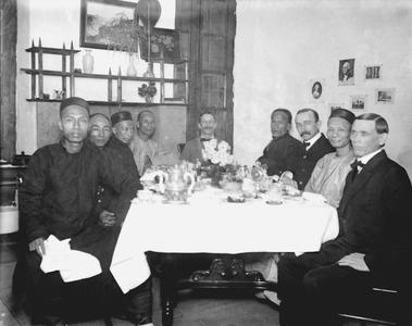 Chinese officials attend a dinner at Doctor Marshall's home in the compound.