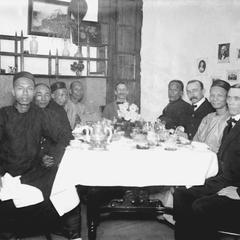 Chinese officials attend a dinner at Doctor Marshall's home in the compound.