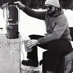 Alan Barbian collecting lake water
