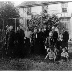 Petinoit family in front of the family farm