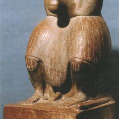 Squatting figure of baboon