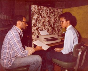 Professor Pope Wright and student typing