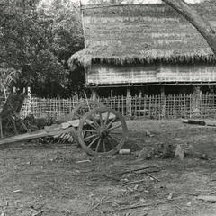 Typical Lu house with cart in Houa Khong Province