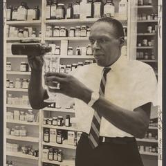 A pharmacist prepares a prescription