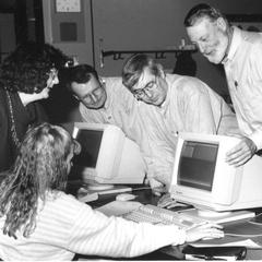 Faculty members with new computers, UW Fond du Lac