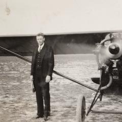 Lindbergh and airplane at airport (Pennco Field) in Madison.