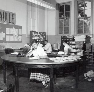Staff members at work, Daily Cardinal office