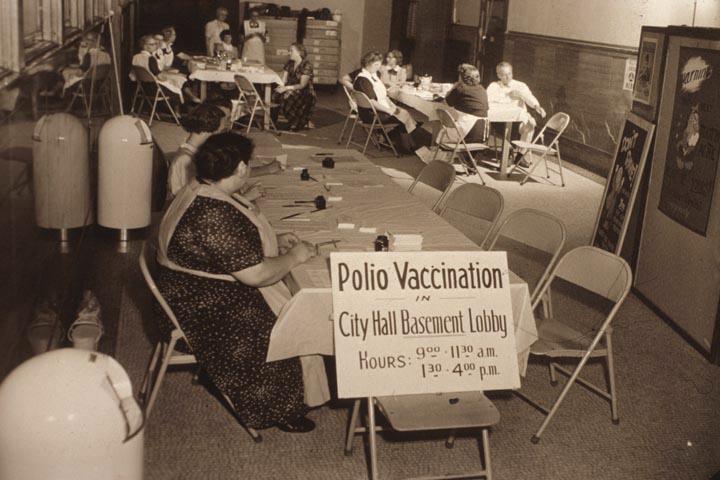 Early Wisconsin polio vaccination clinic set up in a city hall basement - UWDC - UW-Madison Libraries