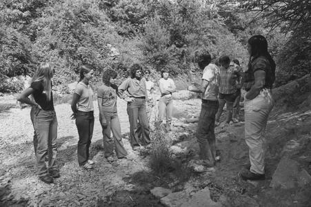Students in dry creek bed