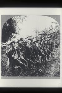 A scouting party of U.S. soldiers during the rainy season, 1910-1920