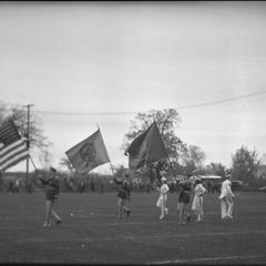 Flags and band at football game