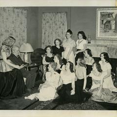 Alpha Phi members listening to a story