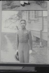 Cadet with cap in hand