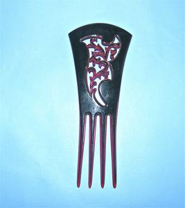 Black comb with geometric shapes