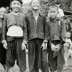Four Blue Hmong (Hmong Njua) boys in a Hmong village in the vicinity of Muang Vang Vieng in Vientiane Province