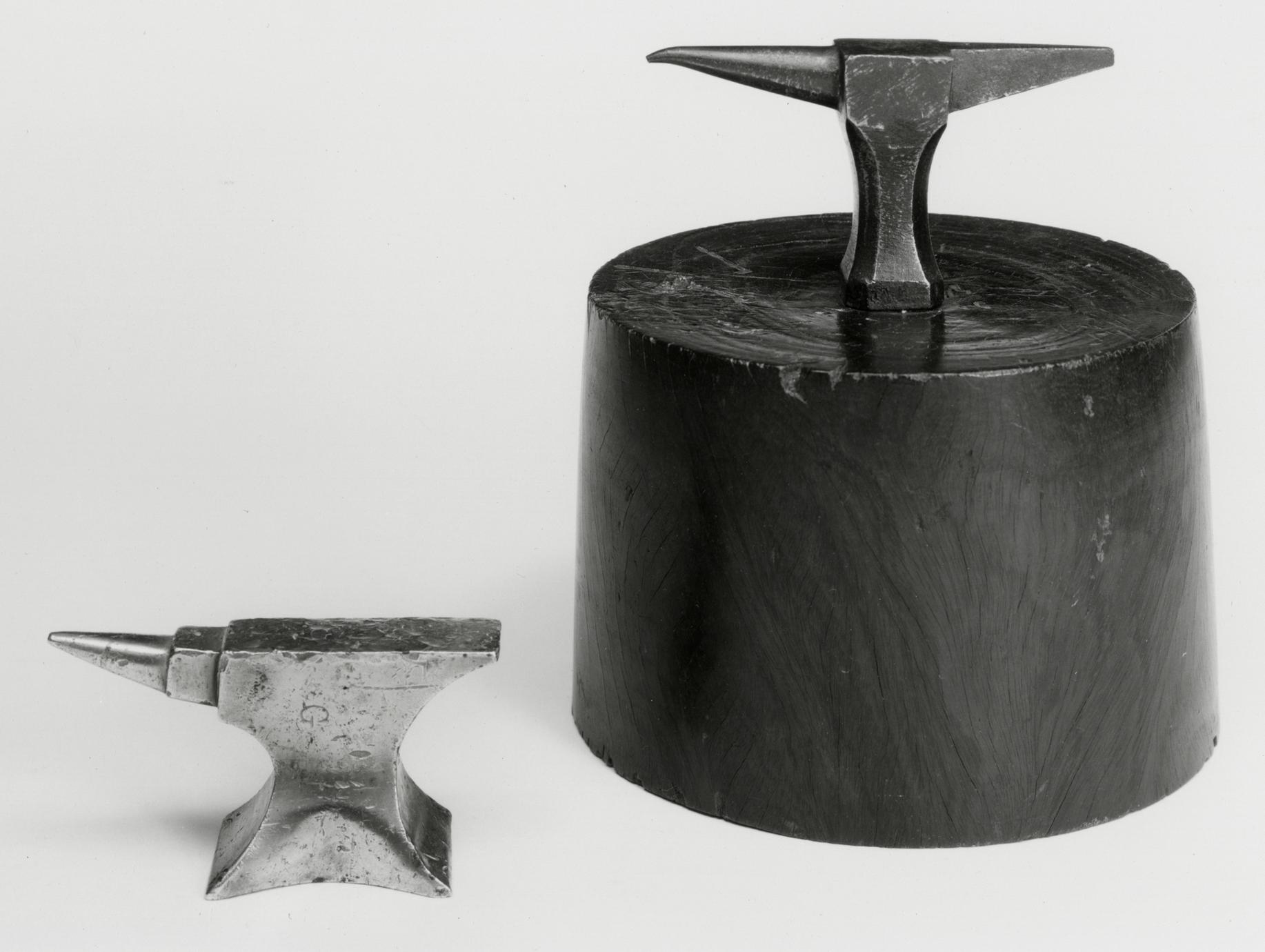 Black and white photograph of clockmaker's and watchmaker's anvils (break iron).