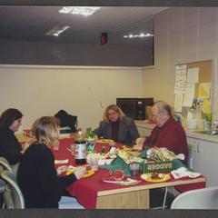 Tom Fitz (Librarian) and staff members enjoying a meal