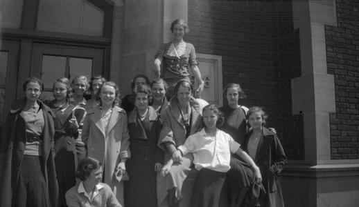 Female students by Dempsey Hall