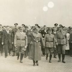 Nazi officers saluting the crowds