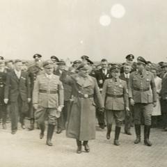 Nazi officer waving to a crowd