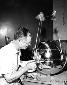 Professor Secretan with radiation balance satellite