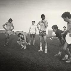 Students playing frisbee