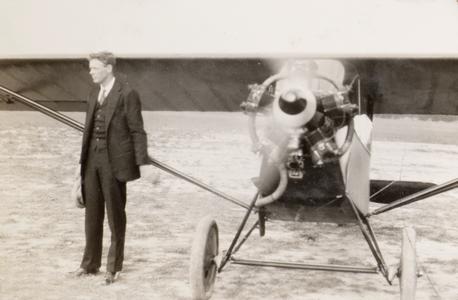Lindbergh and plane at Pennco Field, Madison
