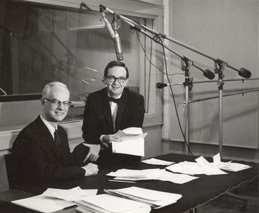 Harold B. McCarty and Karl Schmidt at microphone