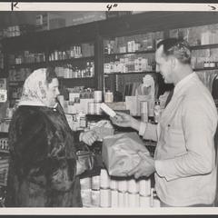 A pharmacist prepares baby products