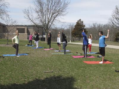Students doing yoga, Janesville, 2013
