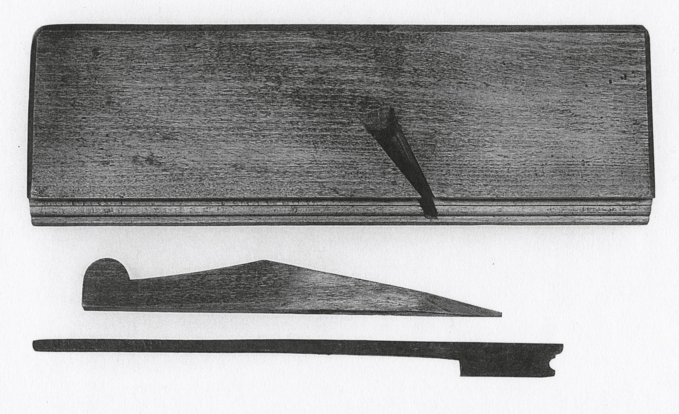 Black and white photograph of a cove plane with bead.