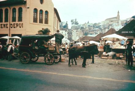 Horse-Drawn Carriage in Front of Variety Store in Zoma Market