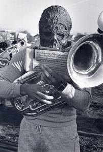 Band member in monster mask