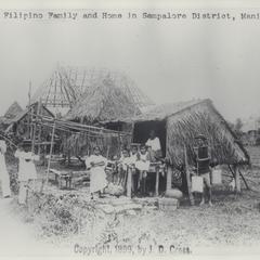 A Filipino family and its home, Manila, 1899