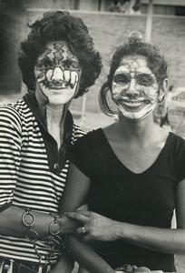 Man and woman with face paint