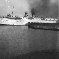 The Milwaukee passing a dock