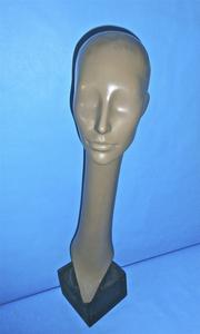 Composition head with unpainted face