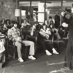 Al McGuire addresses students in the commons lounge