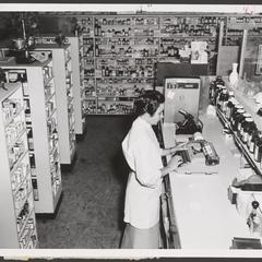 A pharmacist types up a prescription