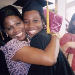 Nonso Njokanma hugs friend at 2003 graduation