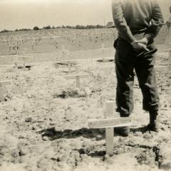 Ray Cunneen finds his high school friend Jack Holum's grave in Margraten cemetery