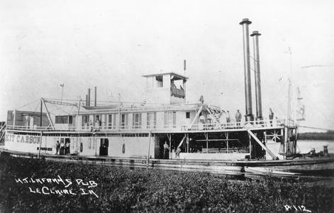 Photograph of side view of the Kit Carson at shore