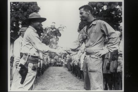 Lieutenant Pondle greeted by Lieutenant Jumah, Jolo, 1945
