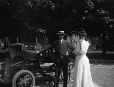Carl Leopold, Sr., and Clara Starker Leopold in front of car