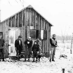 Luna, Carl, Nina, Estella Jr., Estella, and Starker Leopold with shotguns