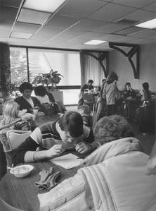 Students studying and relaxing in Garden Cafe in the Library Learning Center
