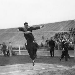 Charles McGinnis high jumping.