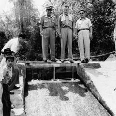 Dedication of United States Aid supported dam; Lao military and other official, head of agriculture division of mission in center
